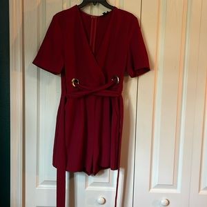 One piece Burgundy Topshop shorts jumper.